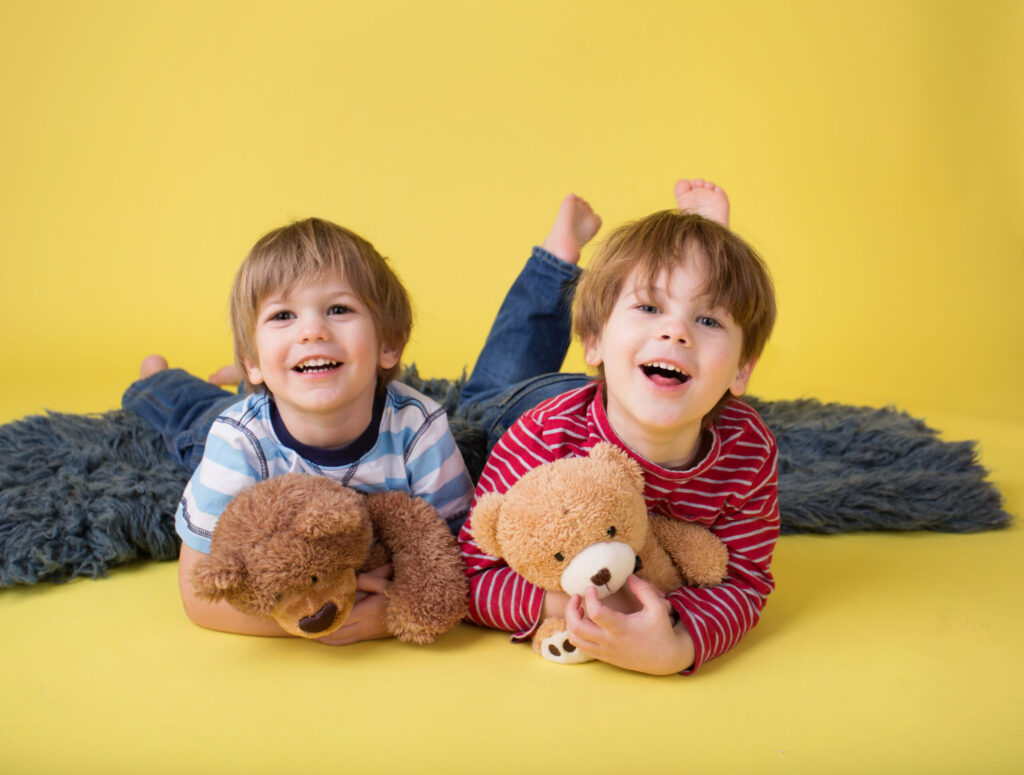 two kids with teddy bears
