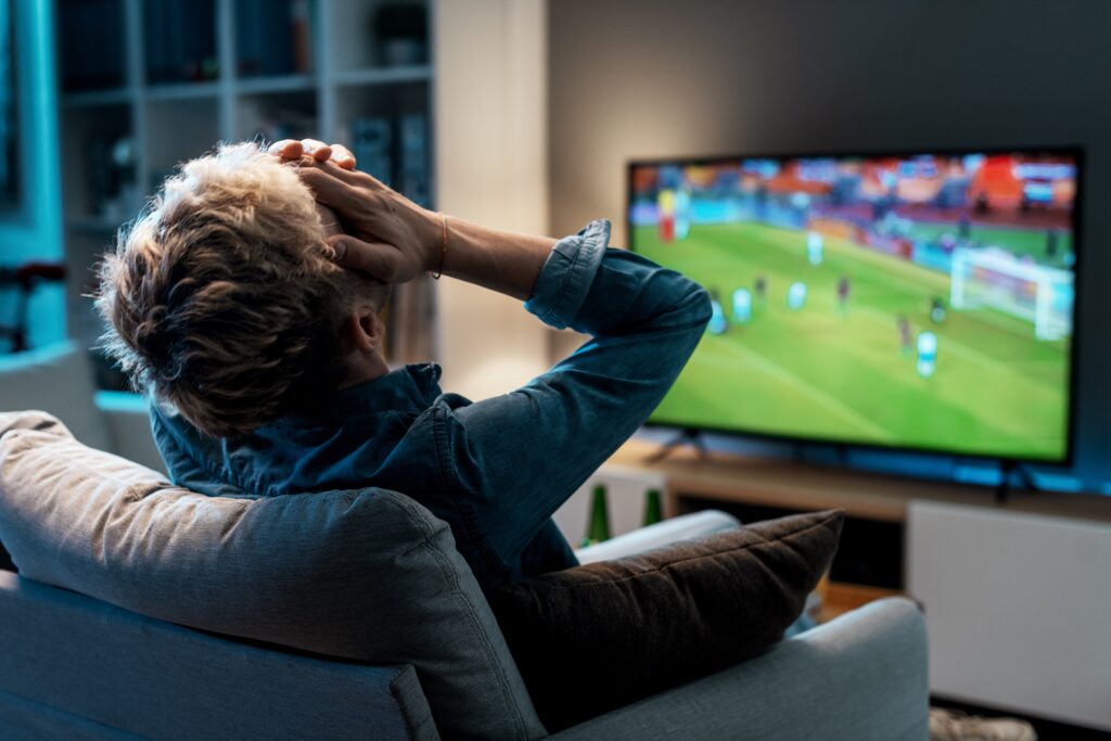 sports watching tv disappointed